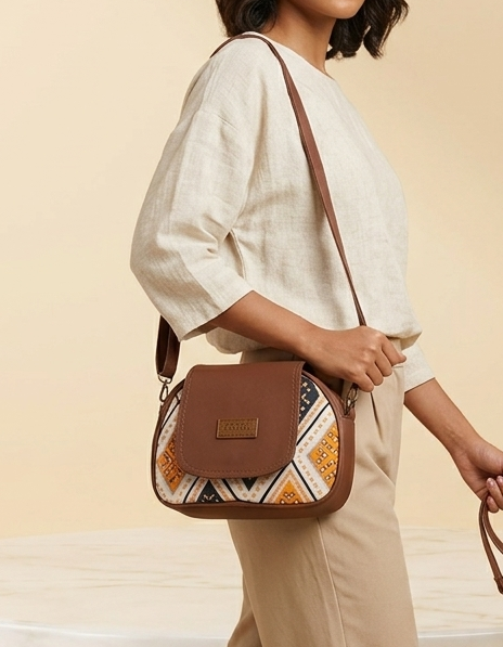 Riva Bandhani Ivory Print Sling Bag